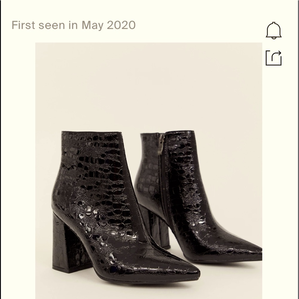 Shiny black detailing booties very cute.